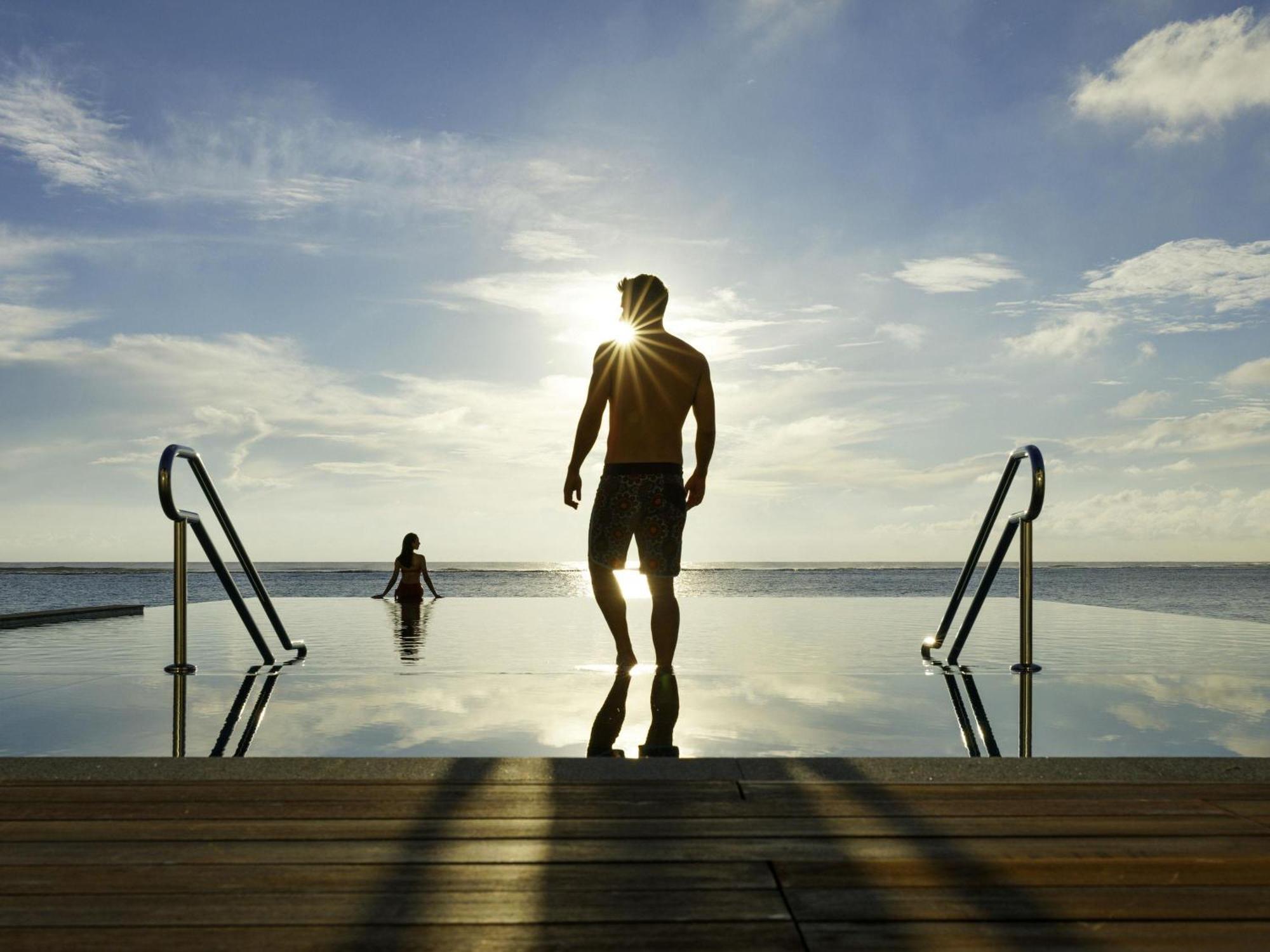 Acomodação de 4 Quartos com Piscina à Beira-Mar